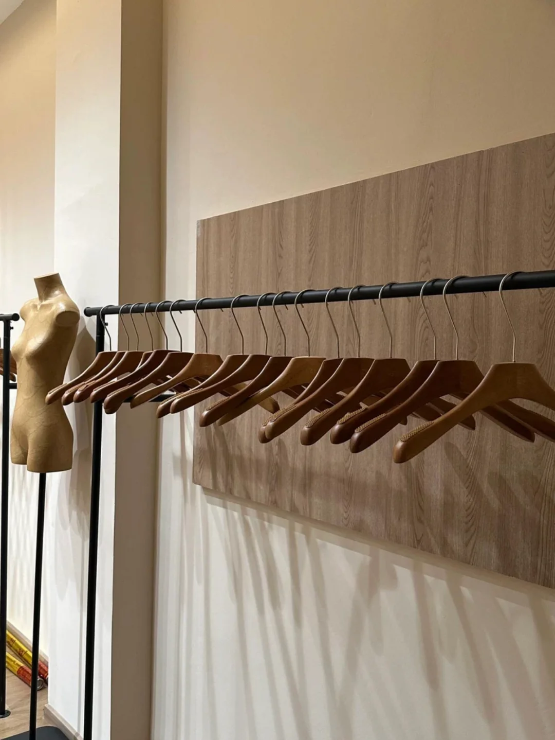Sweater hanger for custom knitwear retail packaging