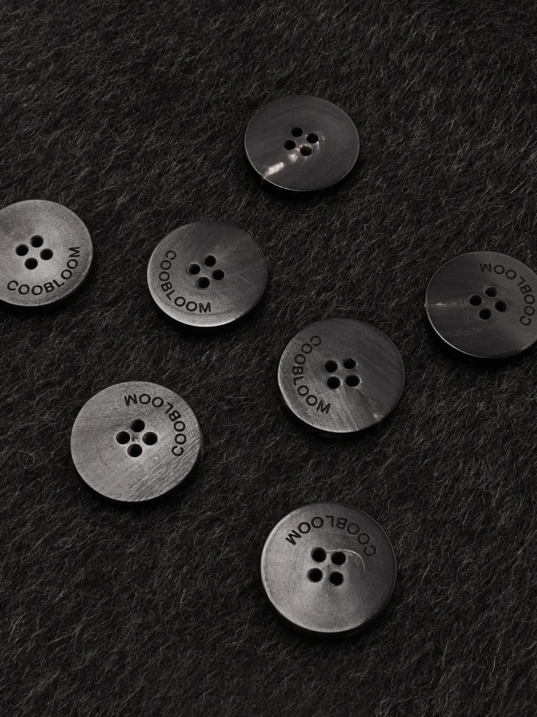 Sweater buttons and trim for custom garment manufacturing