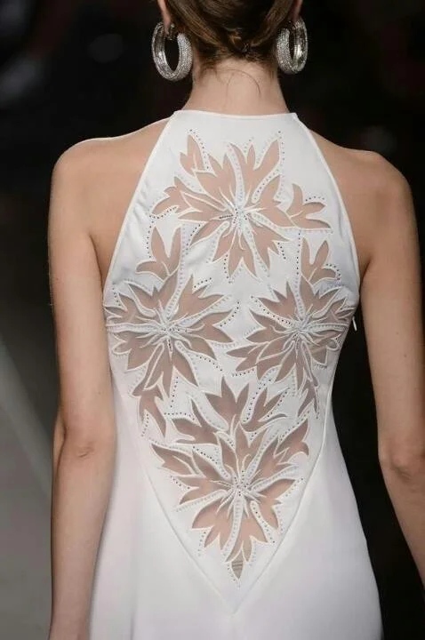 Knit dress with eyelet embroidery detail