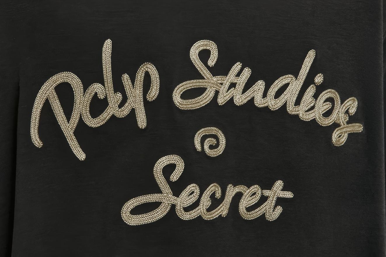 Chain stitch embroidery on custom knitwear