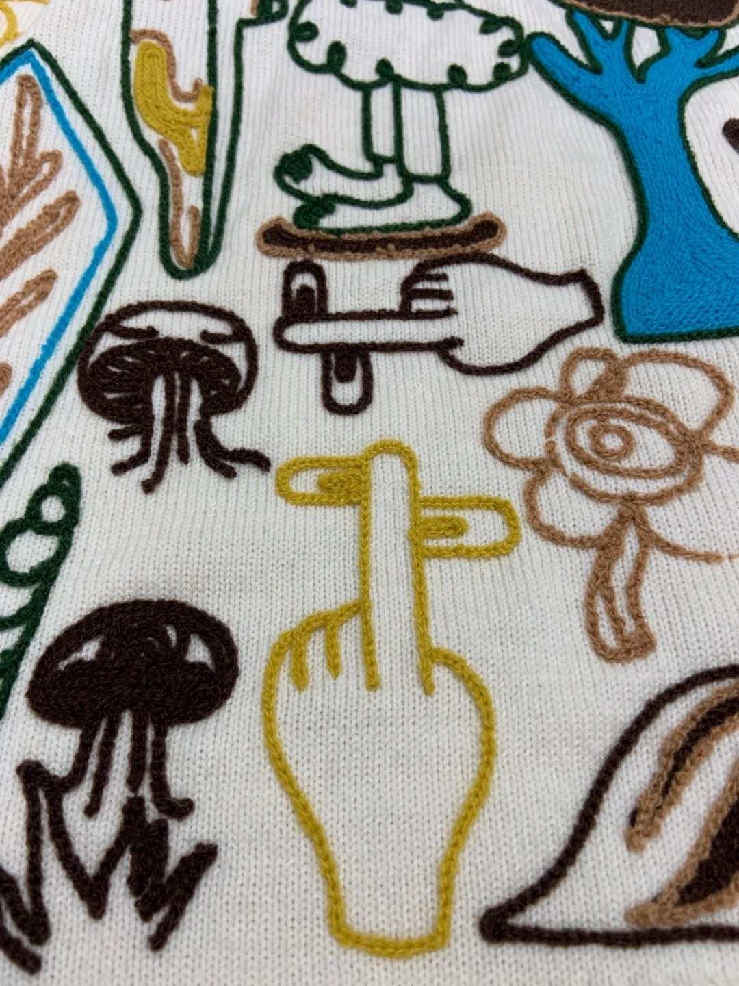 Chain stitch embroidery designs for knitwear