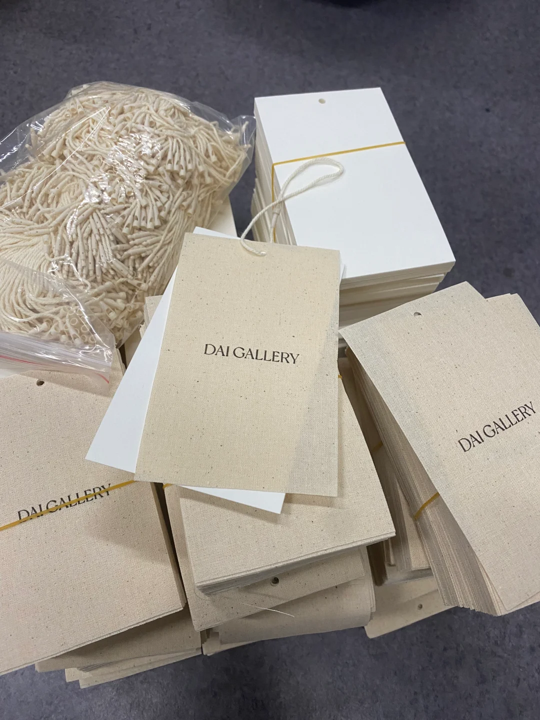 Hang tag for sweater garment branding