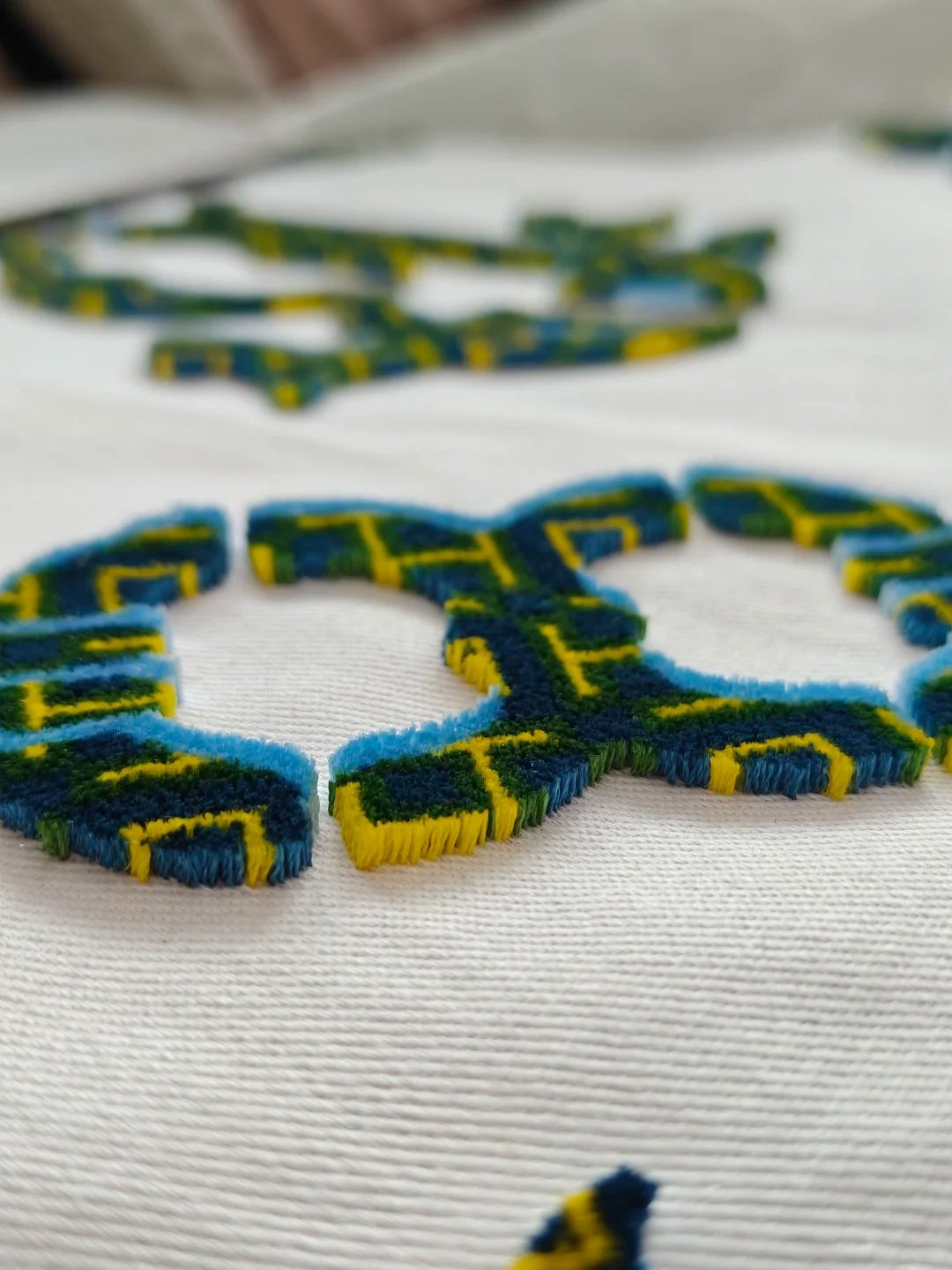 Loop pile embroidery on custom knitwear