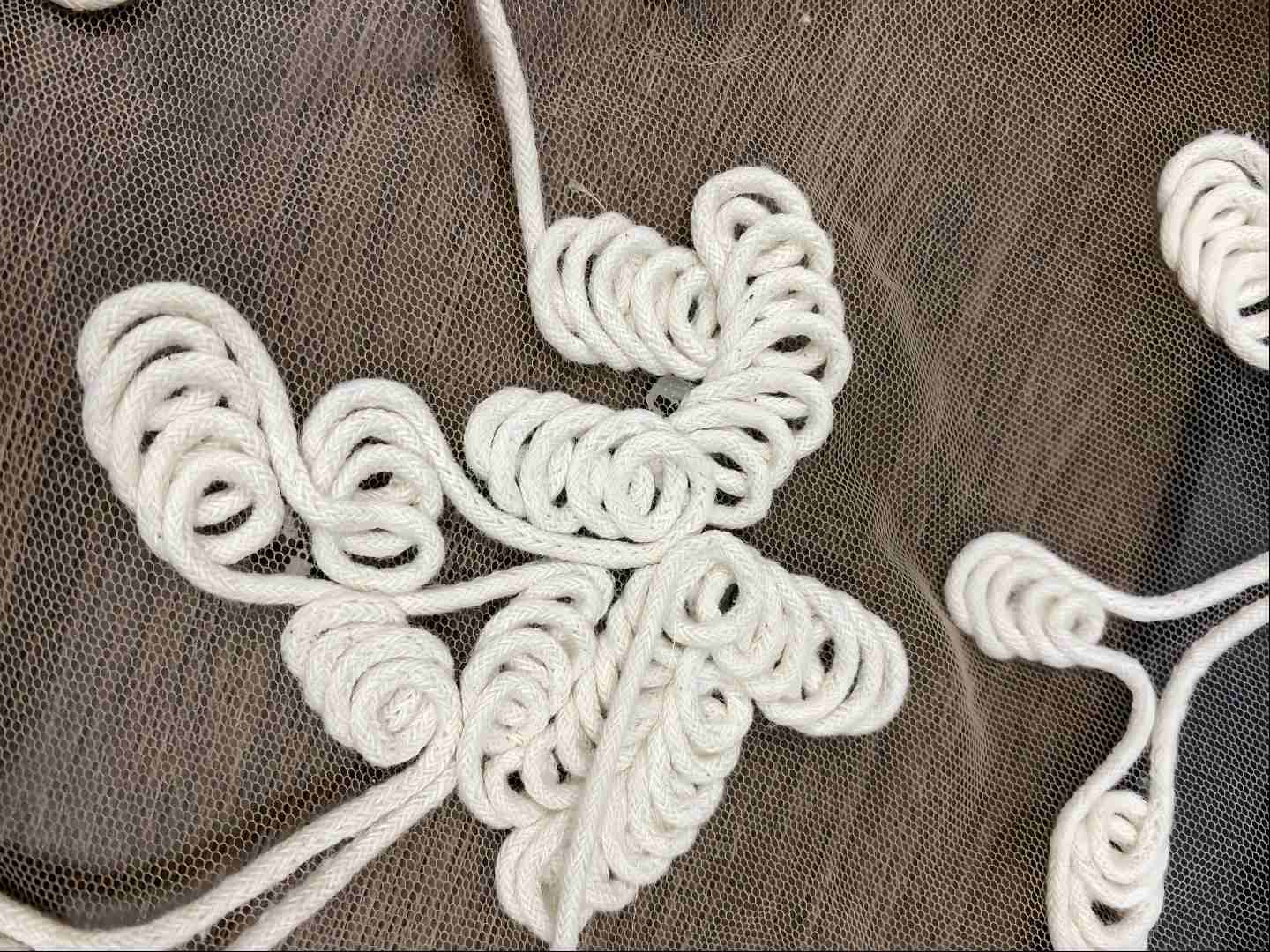 Rope stitch embroidery on custom sweater