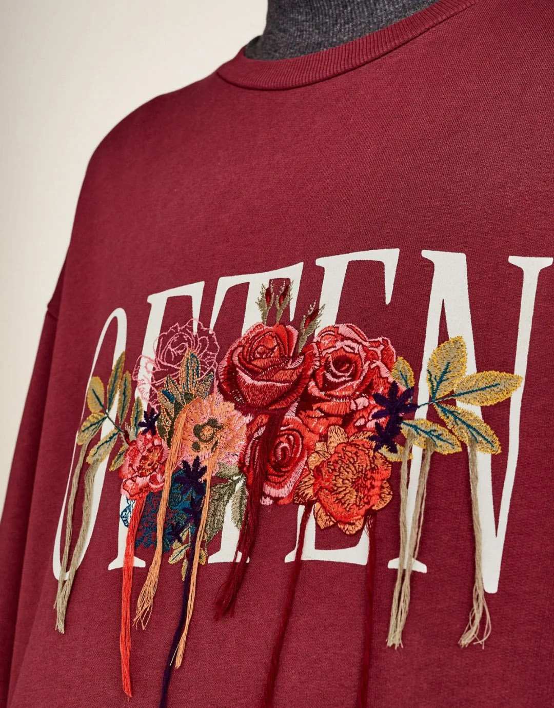 Tassel embroidery detail on knitwear