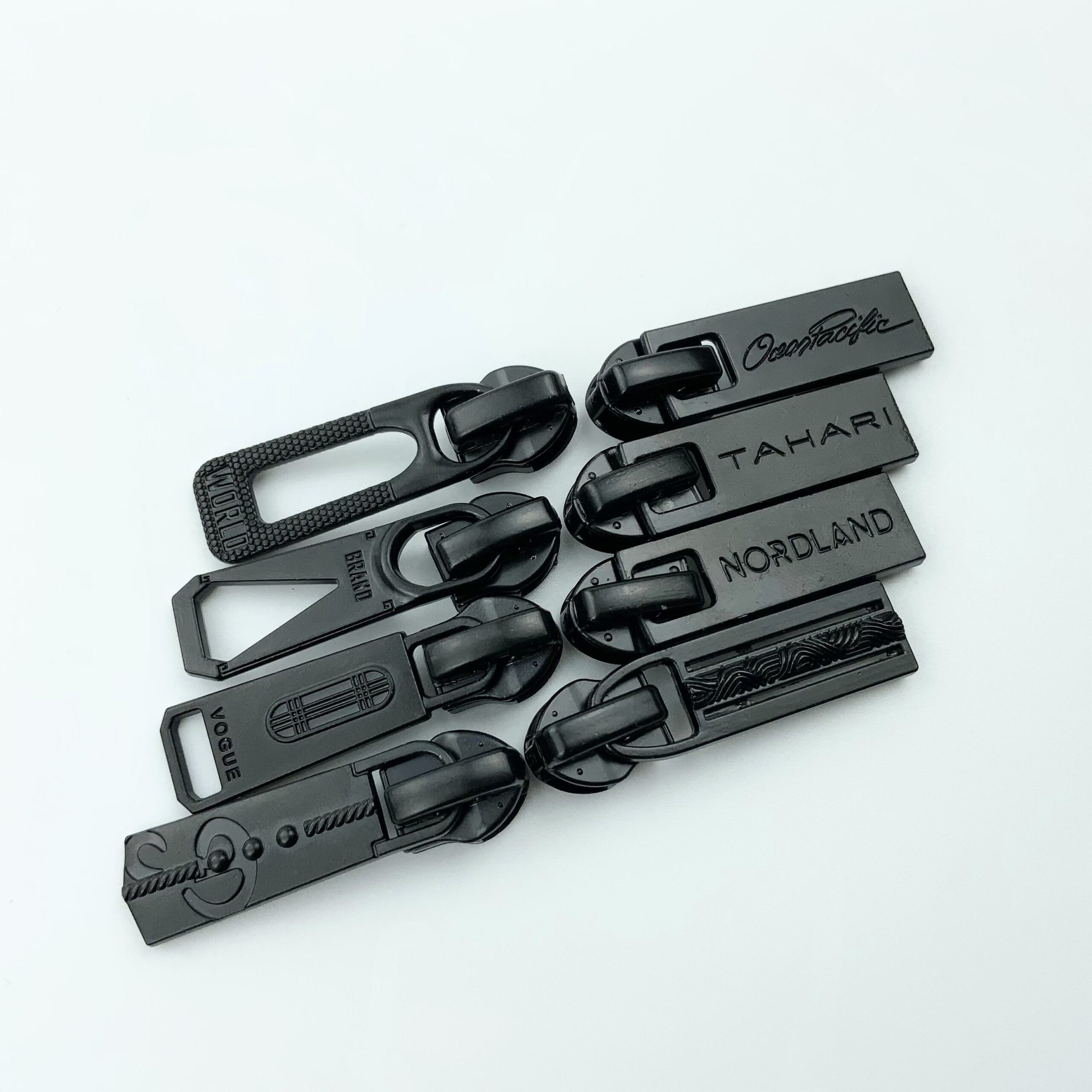 Metal zipper pulls for custom knitwear and sweaters